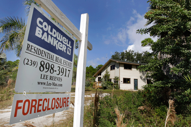 In this 2010 photo, a foreclosed house is shown in Lee County, Florida. Working American families continue to struggle, but without sufficient media coverage to document it. (AP/Chris O'Meara)