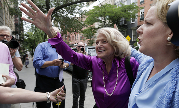 Edith Windsor, left, the plaintiff in the historic <em>United States v. Windsor</em> case before the U.S. Supreme Court, accompanied by her attorney Roberta Kaplan, arrives at the LGBT Center for a news conference, in New York, Wednesday, June 26, 2013. (AP/Richard Drew)