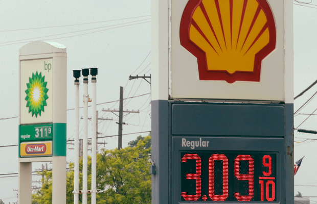 In this Monday, July 1, 2013 photo, a Shell gas station in North Olmsted, Ohio, sells regular unleaded gasoline for $3.09 per gallon with the BP across the street at $3.11 per gallon. (AP/Mark Duncan)