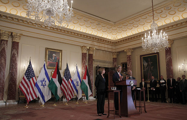 Secretary of State John Kerry stands with Tzipi Livni, left, Israel's justice minister and chief negotiator, and Saeb Erekat, Palestine's chief negotiator, after the resumption of Israeli-Palestinian peace talks, Tuesday, July 30, 2013, at the State Department in Washington. (AP/Charles Dharapak)