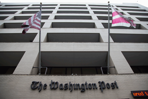 On Monday, August 6, Amazon.com founder Jeff Bezos bought <em>The Washington Post</em> for $250 million. (AP/Evan Vucci)