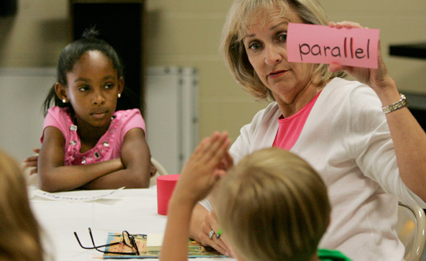 Carol Sample, a math teacher at Pontiac Elementary School, teaches math to a group of students, Tuesday, May 11, 2010, in Columbia, South Carolina. (AP/Mary Ann Chastain)