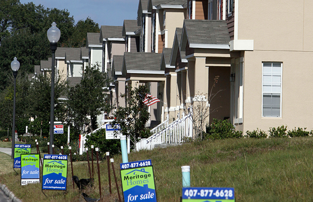 This December 20, 2011 photo shows a row of new homes for sale in Winter Garden, Florida. (AP/John Raoux)