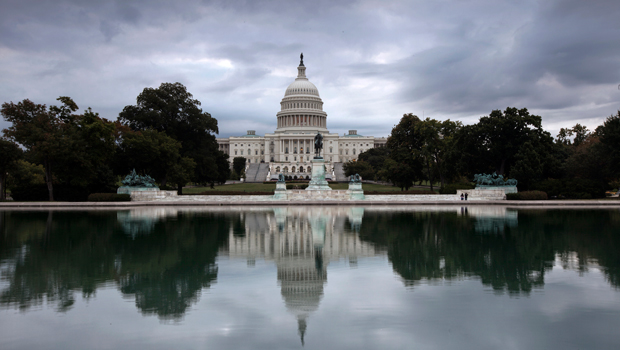 Clouds hang over Capitol Hill in Washington, Friday, September 27, 2013. (AP/J. Scott Applewhite)