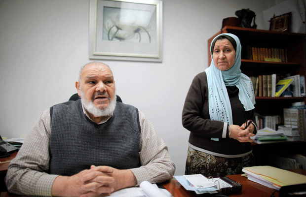 Mohammed el-Sioufi, vice president of the Islamic Culture Center, and his wife, Nagiba, are interviewed about the New York Police Department's surveillance of the Muslim community in Newark, New Jersey. (AP/Charles Dharapak)