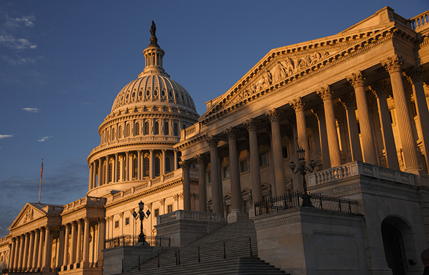 The morning sun illuminates the U.S. Capitol in Washington, Monday, September 30, 2013, as the government teeters on the brink of a partial shutdown at midnight unless Congress can reach an agreement on funding. (AP/J. Scott Applewhite)