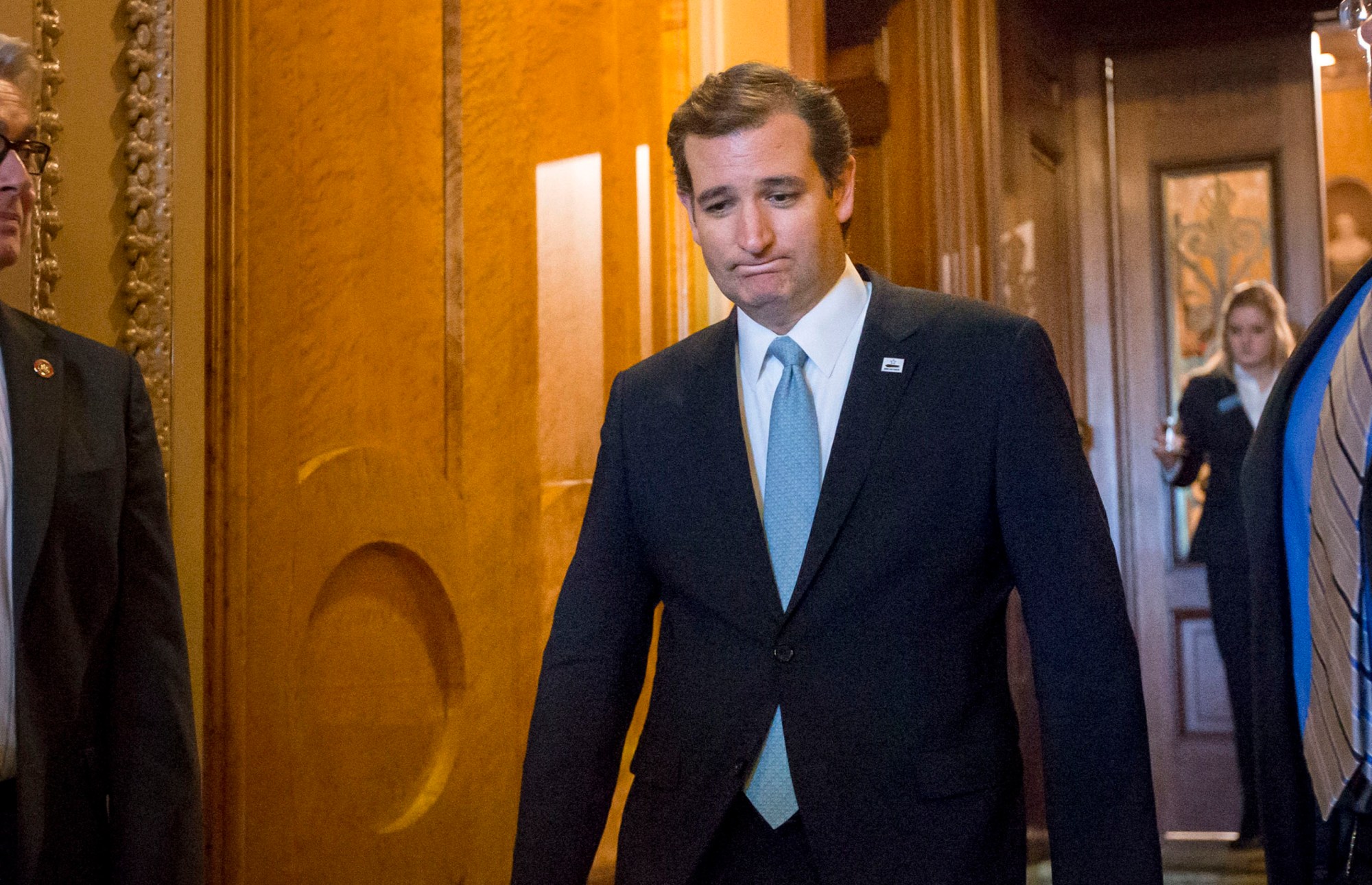 Sen. Ted Cruz (R-TX) emerges from the Senate Chamber on Wednesday, September 25, 2013, after his overnight crusade against the Affordable Care Act, popularly known as Obamacare. (AP/J. Scott Applewhite)