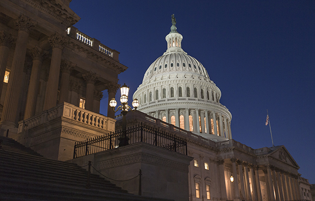 In a rare weekend session at the Capitol, the House of Representatives works into the night to pass a bill to fund the government, Saturday, September 28, 2013. (AP/J. Scott Applewhite)