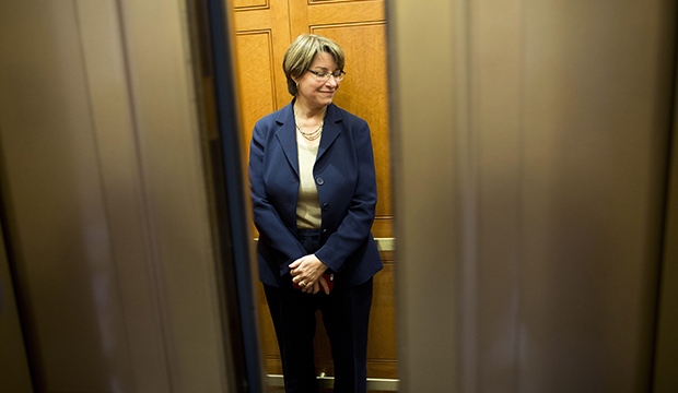 Sen. Amy Klobuchar (D-MN) gets on an elevator on Capitol Hill on Monday, October 14, 2013, in Washington. (AP/Evan Vucci)
