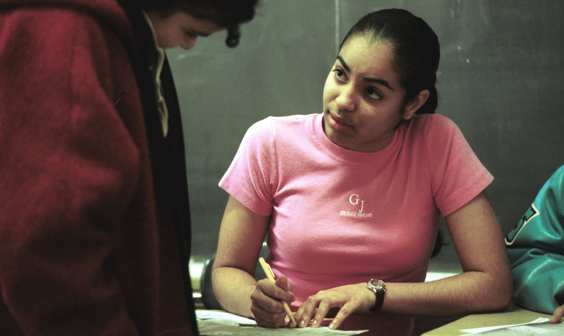 Cindy Luzon, 17, tutors another student as part of Project Adelante at Kean University in Union County, New Jersey. (AP/Jill C. Becker)