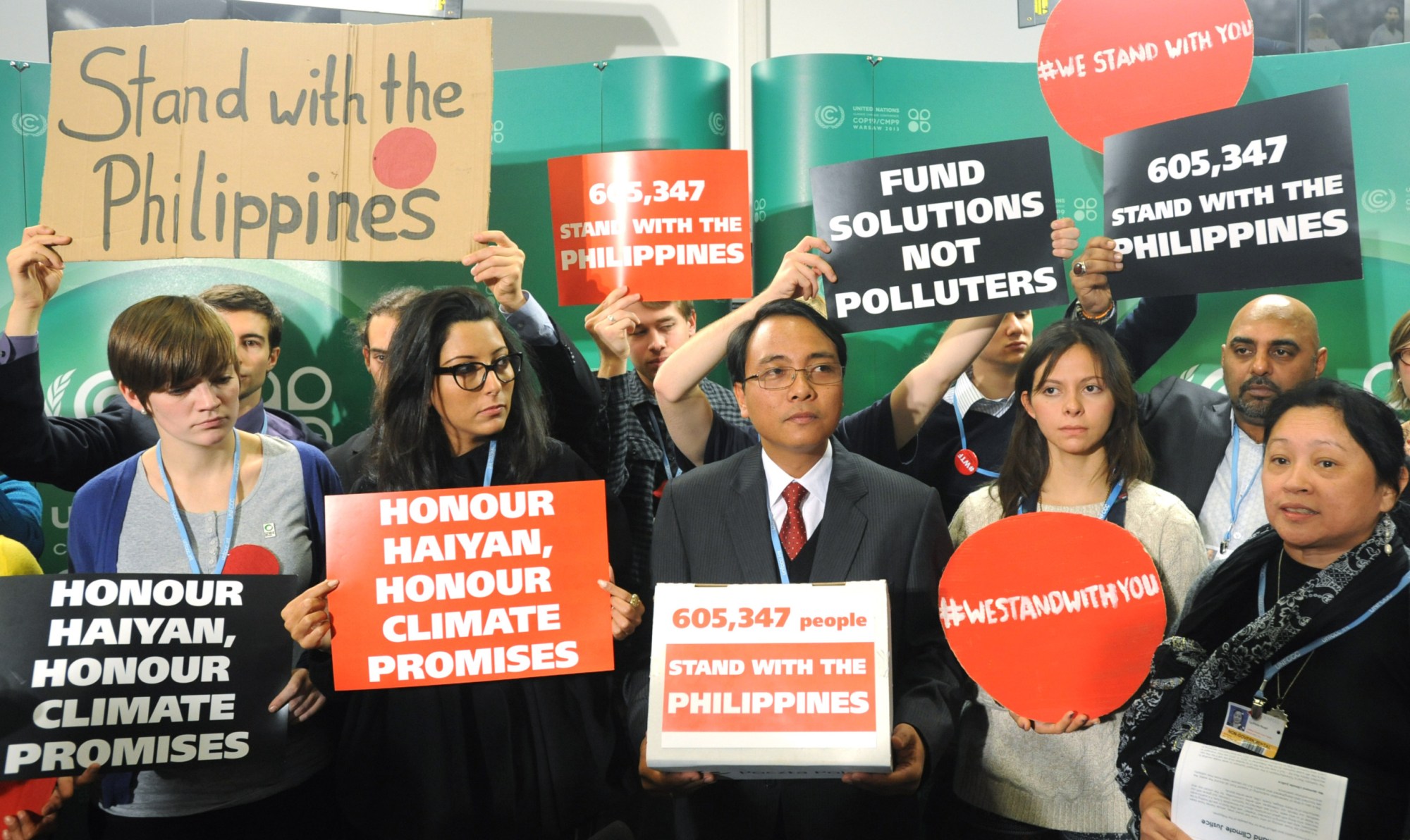 Philippines' delegate Yeb Sano delivers a global petition calling for urgent action to prevent more super typhoons to delegates at the U.N. Climate Conference in Warsaw. (AP/Alik Keplicz)