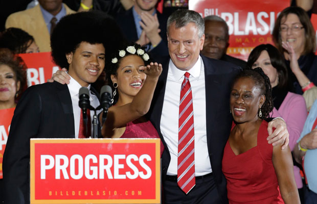 Democratic Mayor-elect Bill de Blasio celebrates with son Dante, daughter Chiara, and wife, Chirlane, after he was elected the first Democratic mayor of New York City in 20 years. (AP/Kathy Willens)