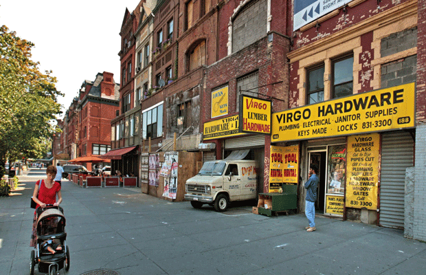 In a clash of cultures, gentrification continues to impact this neighborhood in Harlem, with new condos for sale for up to $4 million. (AP/Bebeto Matthews)