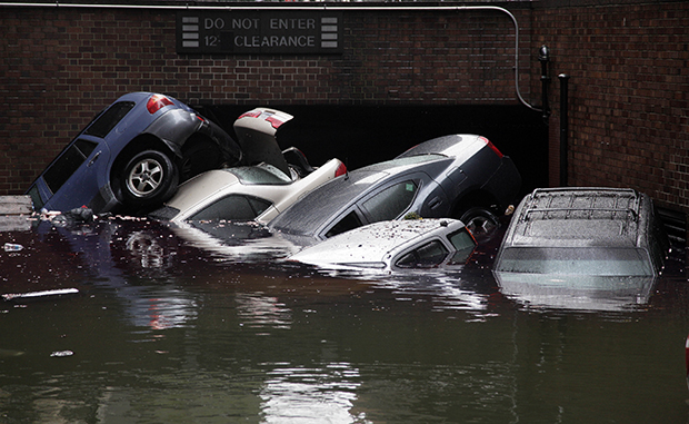 Cars are submerged at the entrance to a parking garage in New York's Financial District in the aftermath of Superstorm Sandy, Tuesday, October 30, 2012. (AP/Richard Drew)