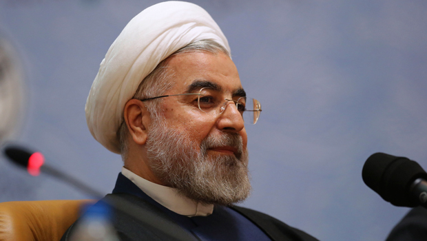 Iranian President Hassan Rouhani sits while attending the 27th International Islamic Unity Conference in Tehran, Iran, Friday, January 17, 2014. (AP/Vahid Salemi)