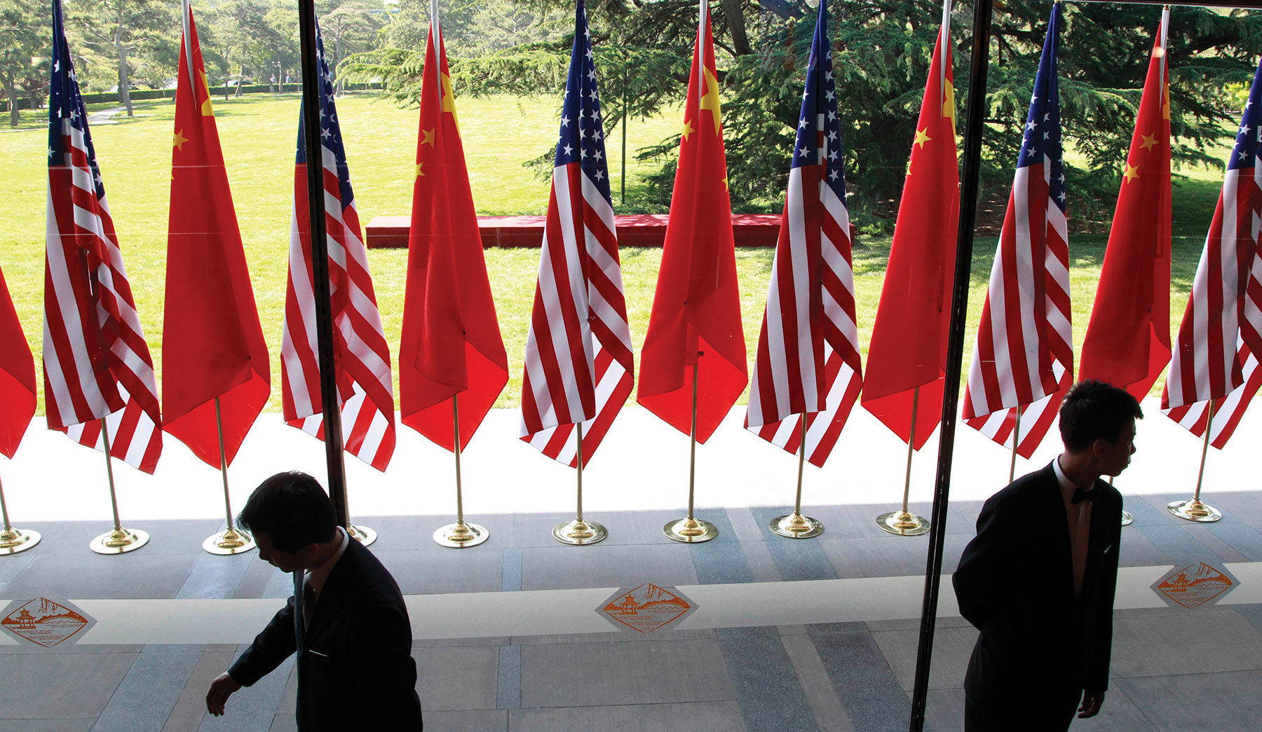 Chinese and U.S. national flags are posted for the opening ceremony of the U.S.-China Strategic and Economic Dialogue in Beijing in May 2012. (AP/Vincent Thian)