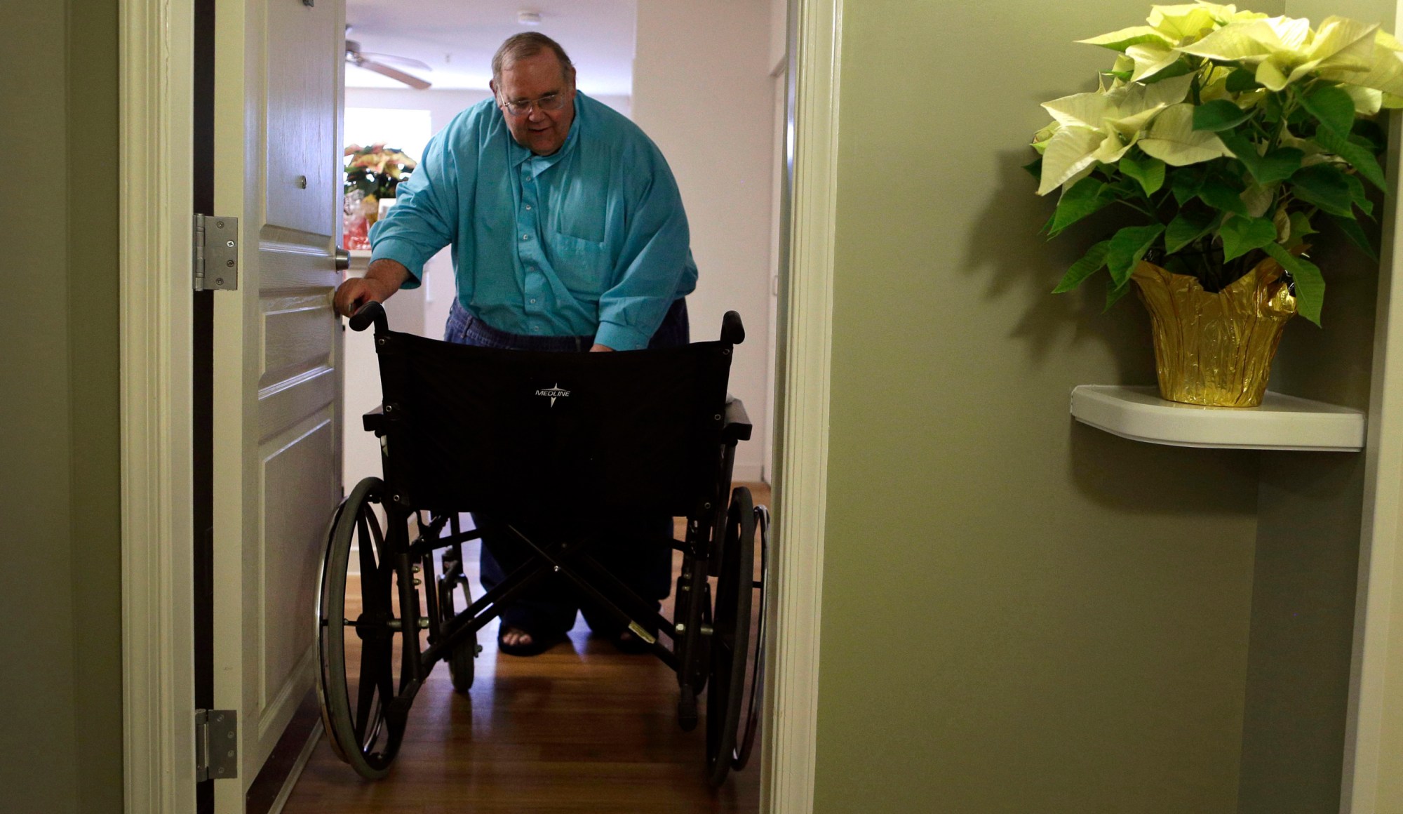 (Man with wheelchair)