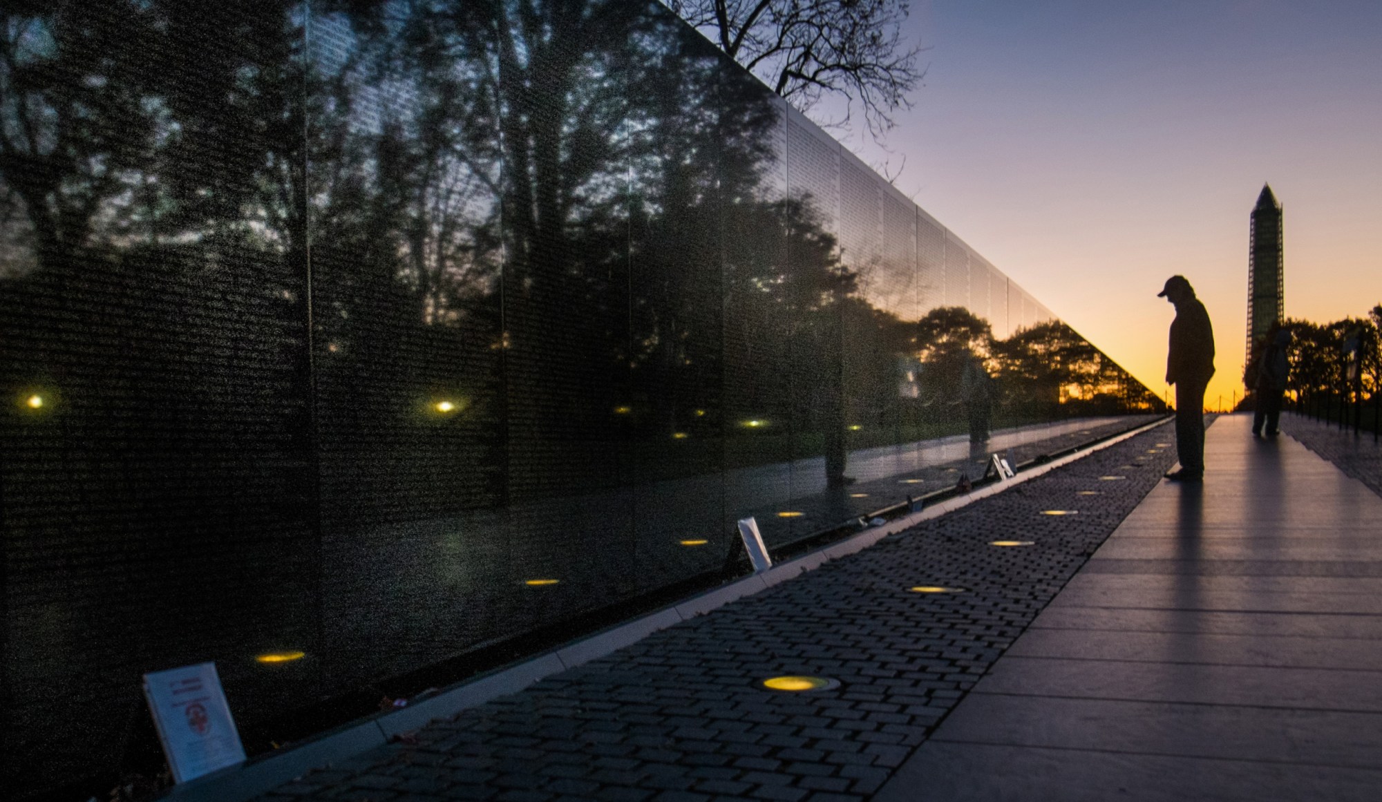  (Veteran at Vietnam memorial)