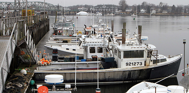 Fishing boats are seen at the Commercial Fishing Pier in Portsmouth, New Hampshire, February 1, 2012. (AP/Jim Cole)