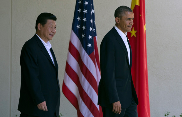 President Barack Obama walks with Chinese President Xi Jinping at the Annenberg Retreat in California. (AP/Evan Vucci)