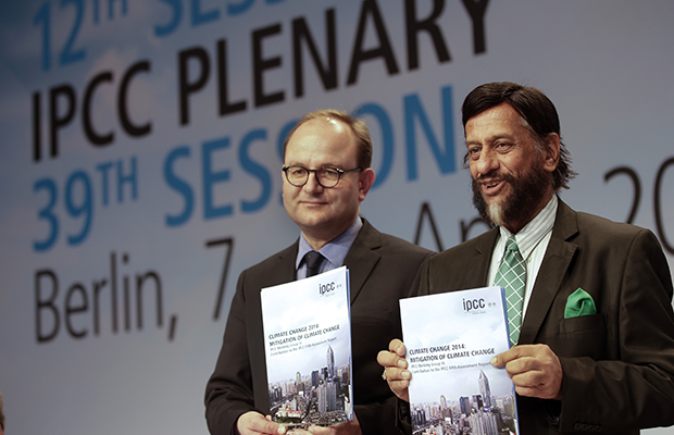 Ottmar Edenhofer, co-chairman of the Intergovernmental Panel on Climate Change's Working Group III, and Rajendra K. Pachauri, chairman of the IPCC, from left, pose prior to a press conference as part of a meeting of the IPCC in Berlin, Germany, Sunday, April 13, 2014. (AP/Michael Sohn)