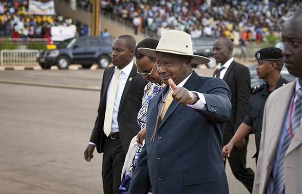 Ugandan President Yoweri Museveni arrives at an anti-gay rally organized by a coalition of Ugandan religious leaders and government officials at the Kololo Independence grounds in Kampala, Uganda, Monday, March 31, 2014. (AP/Rebecca Vassie)