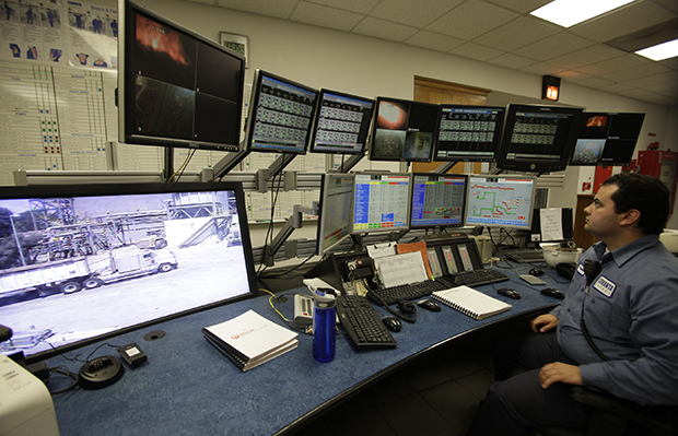 Shown is a control room of a moving grate incinerator overseeing boiler lines at the Southeast Resource Recovery Facility in Long Beach, California, August 24, 2010. (AP/Damian Dovarganes)