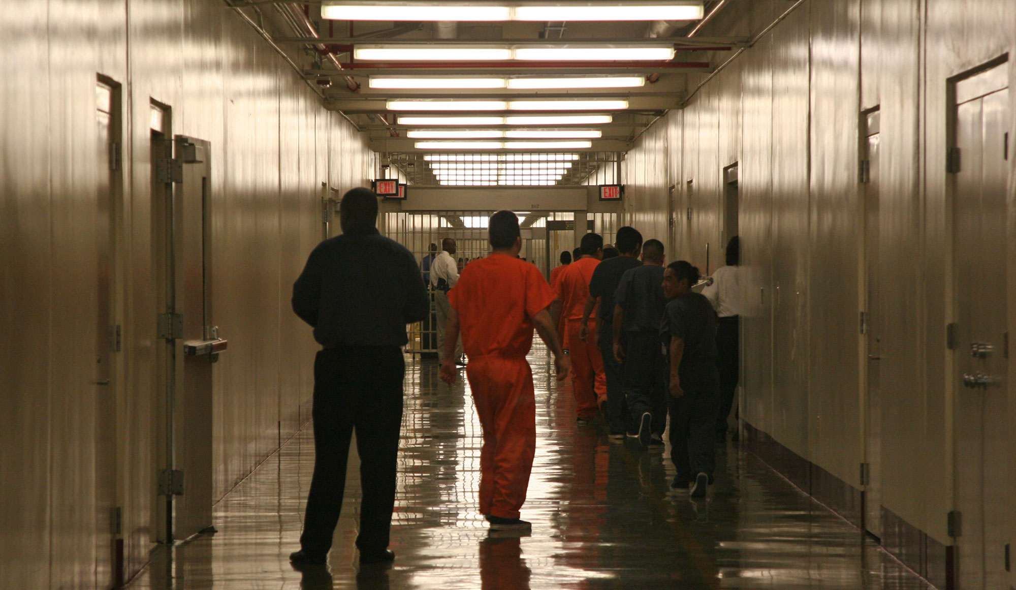 Detainees leave the the cafeteria at the Stewart Detention Facility, a Corrections Corporation of America immigration facility in Lumpkin, Georgia. (AP/Kate Brumback)