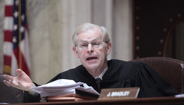 Wisconsin Supreme Court Justice David Prosser poses a question to Dane County Circuit Court Representative Marie A. Stanton during a hearing at the Wisconsin State Capitol, June 6, 2011. (AP/John Hart)