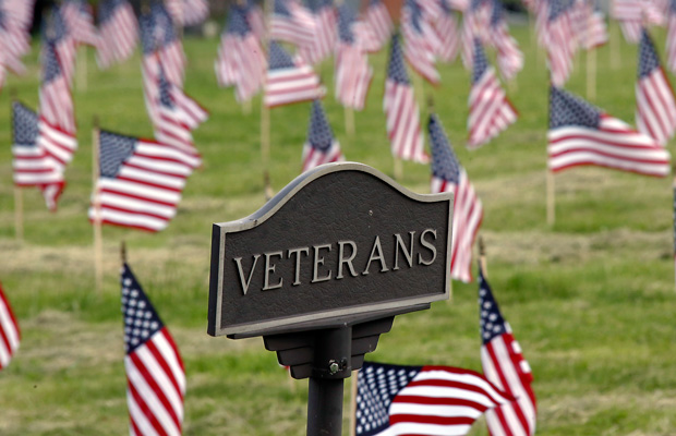 Hundreds of American flags adorn the grave sites in a veterans section of the Allegheny Cemetery in Pittsburgh on Thursday, May 22, 2014 (AP/Keith Srakocic)