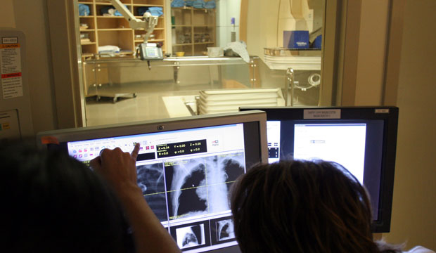 Radiation therapists use X-rays to show the exact position of a patient's tumor at the M.D. Anderson Proton Therapy Center in Houston, Texas. (AP/Pat Sullivan)