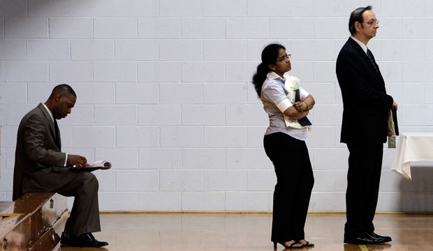 Job seekers wait in a line at a job fair in Southfield, Michigan. (AP/Paul Sancya)