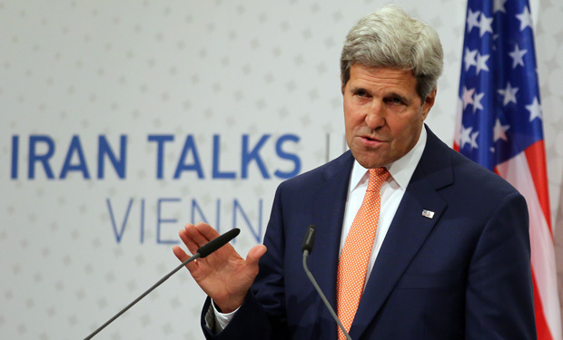 U.S. Secretary of State John Kerry speaks to the media after closed-door nuclear talks on Iran in Vienna, Austria, Tuesday, July 15, 2014. (AP/Ronald Zak)