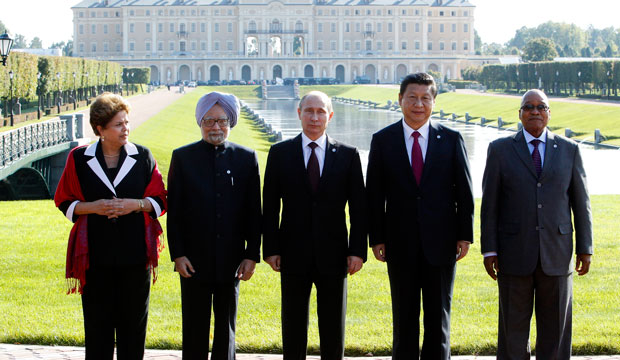 From left, Brazil's President Dilma Rousseff, India's former Prime Minister Manmohan Singh, Russia's President Vladimir Putin, China's President Xi Jinping, and South African President Jacob Zuma pose for a photo after a BRICS leaders' meeting at the September 2013 G-20 Summit in St. Petersburg, Russia. (AP/Sergei Karpukhin)