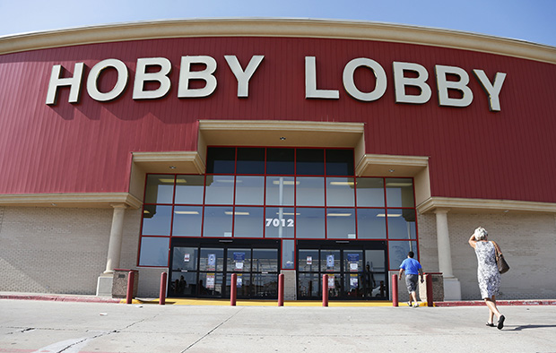 Customers walk to a Hobby Lobby store in Oklahoma City, Oklahoma, Monday, June 30, 2014. (AP/Sue Ogrocki)