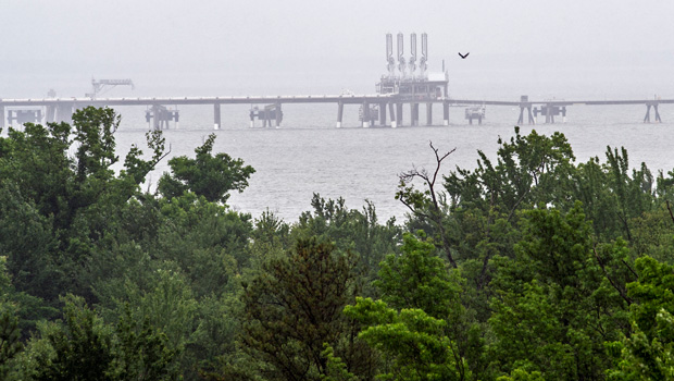 The Dominion Cove Point LNG Terminal is seen from the nature preserve that surrounds the plant in Lusby, Maryland, June 12, 2014. (AP/Cliff Owen)