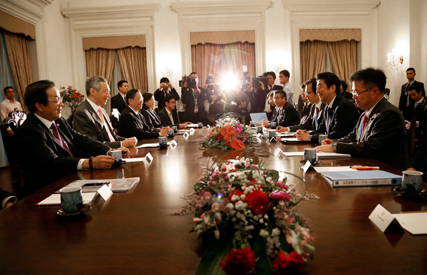 Officials attend a bilateral meeting at the Asia Security Summit in Singapore, known as the Shangri-La Dialogue, May 31, 2014. (AP/Wong Maye-E)