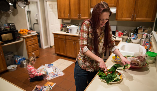 Maggie Barcellano, who lives with her father, enrolled in the Supplemental Nutrition Assistance Program to help save for paramedic training while she raises her three-year-old daughter. (AP/Tamir Kalifa)