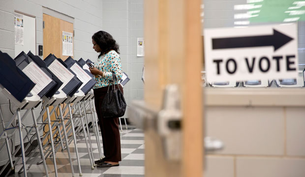 A voter casts her ballot at a polling site during early voting for Georgia's May 20 primary election in Atlanta. (AP/David Goldman)