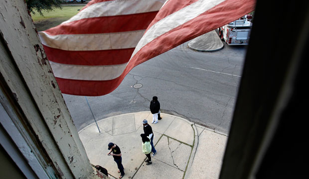 Voters line up at the Engine 26 Ladder 9 firehouse to cast their vote in New Orleans, Louisiana. (AP/Gerald Herbert)