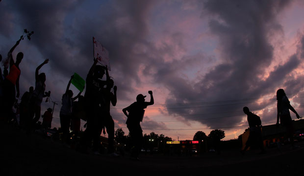 People protest for Michael Brown Jr., who was killed by police on August 9 in Ferguson, Missouri. (AP/Charlie Riedel)