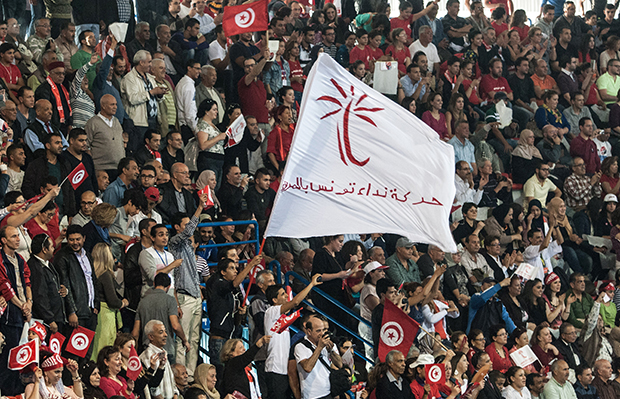 Thousands of supporters of the Nidaa Tunis party attend an electoral meeting in Tunis, Tunisia, November 15, 2014. (AP Photo/Aimen Zine)