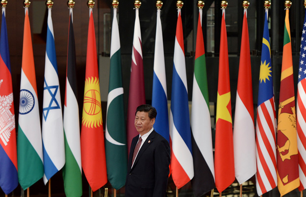 Chinese President Xi Jinping welcomes leaders before the opening ceremony at the fourth Conference on Interaction and Confidence Building Measures in Asia summit in Shanghai, China, May 2014. (AP/Mark Ralston)