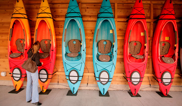 A shopper looks at a wall of kayaks at the L.L. Bean store at Ross Park Mall in Ross Township, Pennsylvania. (AP/Gene J. Puskar)