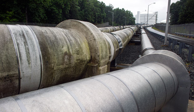 Transfer pipes carry liquefied natural gas to and from a holding tank at an LNG terminal in Lusby, Maryland. (AP/Cliff Owen)