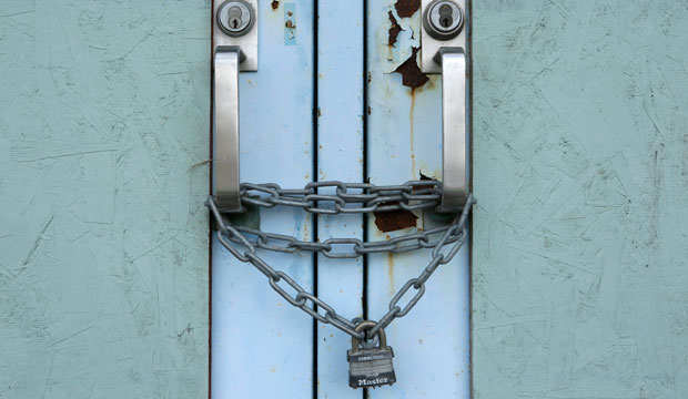 An abandoned school is locked near downtown in Danville, Illinois, where manufacturers that provided thousands of middle-class jobs have closed. (AP/Seth Perlman)