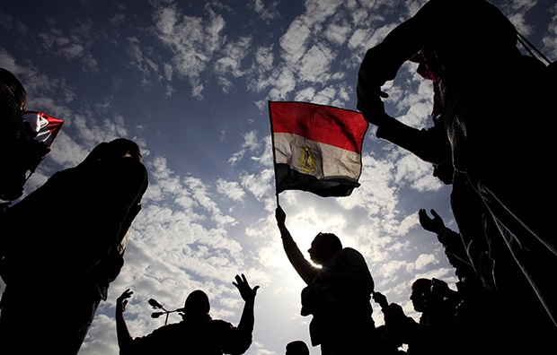 Protesters chant as they wave Egyptian flags during their protest in Cairo, Egypt, February 6, 2011. (AP/Amr Nabil)