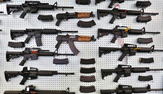 Guns are displayed for sale at an arms seller in Colorado, July 2014. (AP/Brennan Linsley)