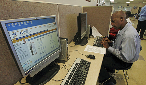 Dale Kornegay searches an employment database at the California Employment Development Department's Crenshaw WorkSource Services Center in Los Angeles, September 8, 2011. (AP/Reed Saxon)