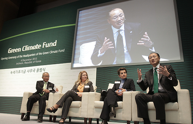 World Bank President Jim Yong Kim, right, speaks during an opening ceremony of the Green Climate Fund headquarters in Songdo, South Korea, December 4, 2013. (AP/Ahn Young-joon)